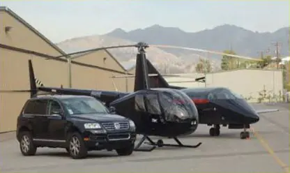 Helicopters and support vehicle on the ramp